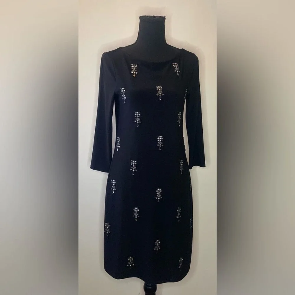 White House black market- Black mini dress with some‎ bedazzled detailing SizeXS